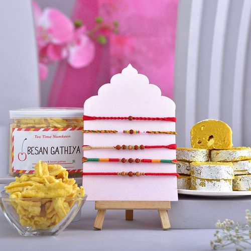 Beautiful Rakhis and Snacks Gift Set